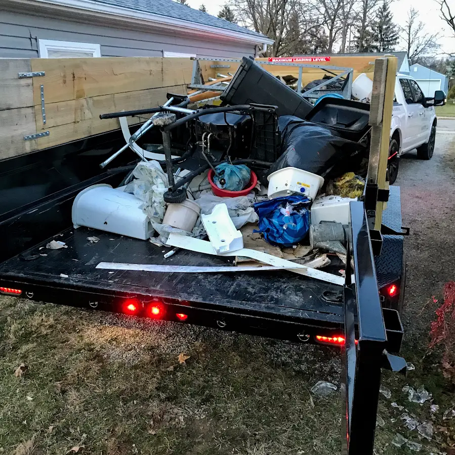 Roll-off dumpster delivered to a residential driveway in Dickinson